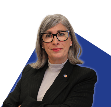 Portrait of Danielle M. Roy on a blue background