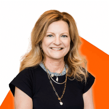 Portrait of Lisa Swiderski on an orange background