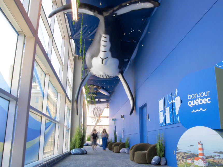 Zone st-laurent, whale on the ceiling and two women walking underneath