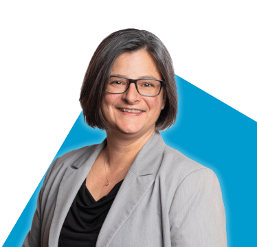 Portrait of Karine Plamondon on a blue background