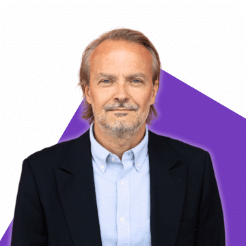 Portrait of Nicolas Joel on a purple background