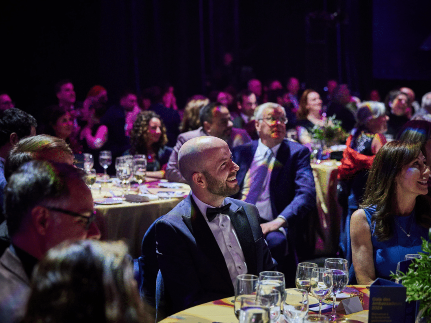 A happy person at a gala evening.